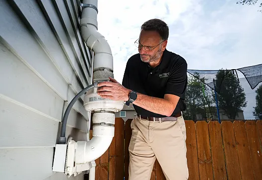 A person looking at an installation