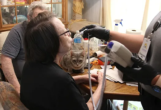 Paramedic taking temperature