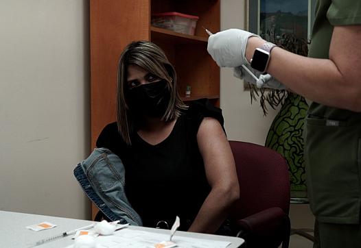 Person sitting for treatment