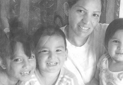 Old photograph of 4 people