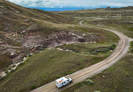 Image of an EMS driving down the rocky road