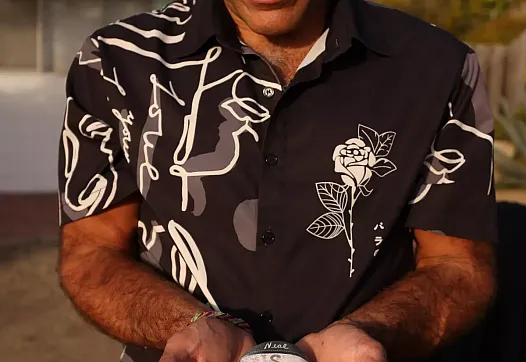 A person holding a stone