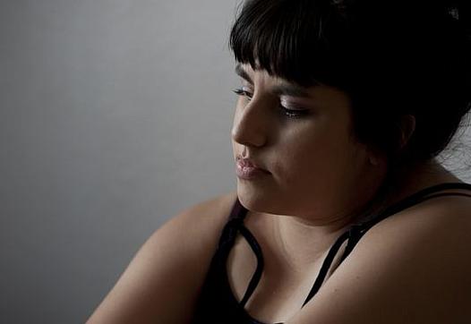 Michelle Rivera, 23, reflects on her past and success in the TAY Crossroads program. (Photo by Ron Holman/Visalia Times-Delta)