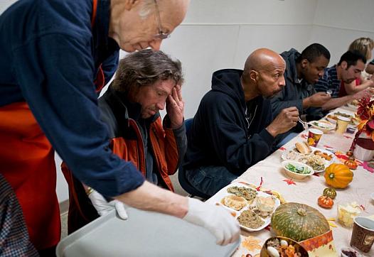 Daniel Sopcak is served a Thanksgiving meal at the Anchorage Gospel Rescue Mission. Sopcak says he rarely utilizes the Rescue Mission because they breath-test and refuse entry to anyone who has been drinking.