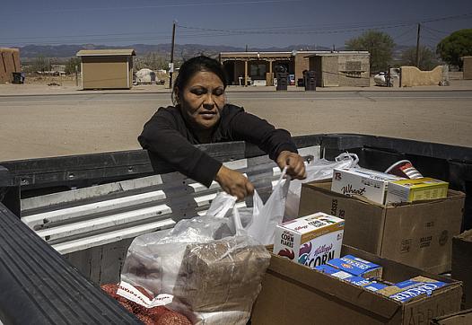 In New Mexico, Lynette Quintana loads up food from the USDA’s Food Distribution Program on Indian Reservations.