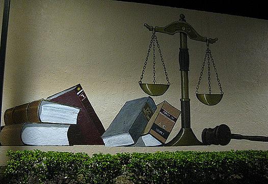 Photo by Flickr: Clyde Robinson: Scales of Justice