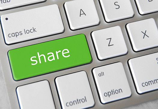 (Image of keyboard with "Share" key)