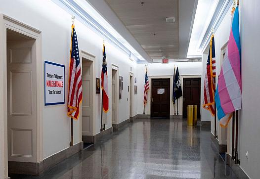 Dueling messages outside the Capitol Hill offices of U.S. Rep. Marjorie Taylor-Greene (R-GA), and Rep. Marie Newman (D-IL). The