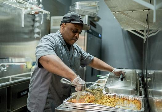 Raymond Galloway, a line cook at a Chicago soul food restaurant, wasn’t able to work regularly for about six months because of h