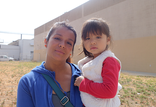 Maria Martinez and daughter Jackie attend a First 5 free produce giveaway in Santa Paula. (Photo by Kit Stolz)