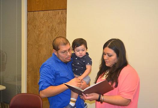 Adrian and Ana Tapia of Brawley with their son Joaquin. Adrian was diagnosed with a brain tumor in December of 2012 while Ana was seven months pregnant. The couple went to the Cancer Resource Center of the Desert in El Centro for help in navigating all the challenges associated with his diagnosis. Photo: Robert Fulton/CHR