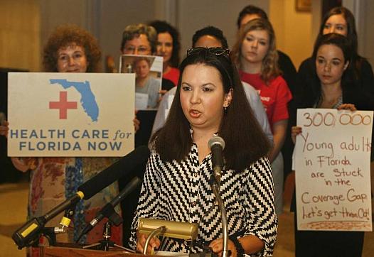 Isabel Betancourt speaks at the Capitol in Tallahassee on April 15, 2015. Betancourt, a resident of Hialeah with rheumatoid arthritis, began paying for her health plan out of pocket after five months of being uninsured because she falls into the Medicaid coverage gap. (Phil Sears/Special to the Herald)  