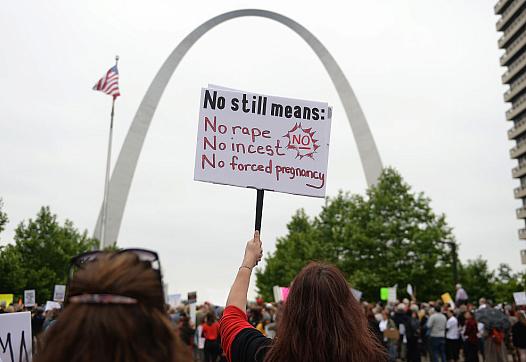 A demonstrator displays a sign during a protest rally over recent restrictive abortion laws on May 21 in St Louis, Missouri. (Ph