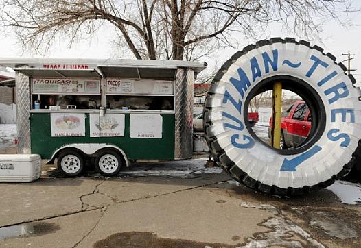 A loncheria cart in the parking lot of a tire store in Globeville. Credit: Stephen Swofford