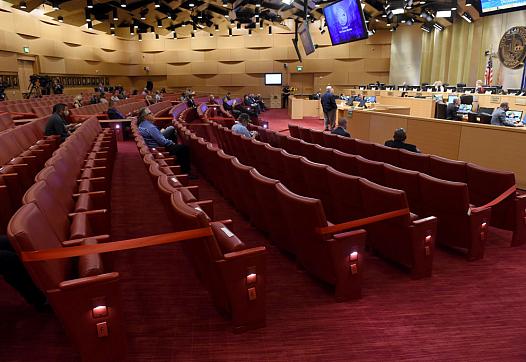 A city council meeting in Las Vegas, where every other row of seats was blocked off for social distancing.