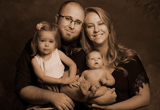 Jessica Porten with her husband and two daughters.