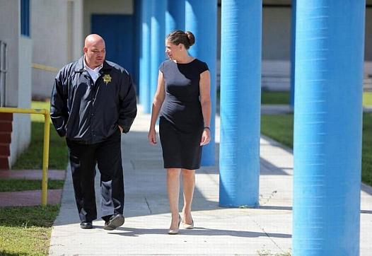 DJJ Secretary Christina K. Daly walks the grounds of the Miami-Dade lockup. Emily Michot