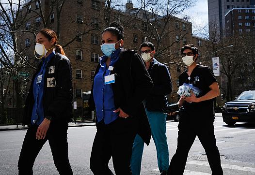 Medical workers outside of Mount Sinai Hospital in New York City. GETTY IMAGES