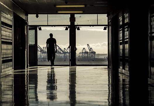A student walks into one of the buildings at San Pedro High School that overlooks the Port of L.A. in San Pedro Wednesd