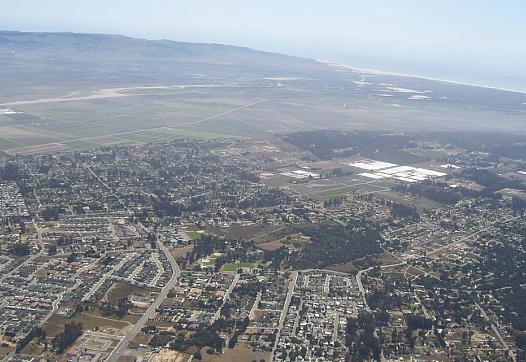 Aerial views of the Nipomo Mesa show a plume of dust that sweeps through the community on windy days.