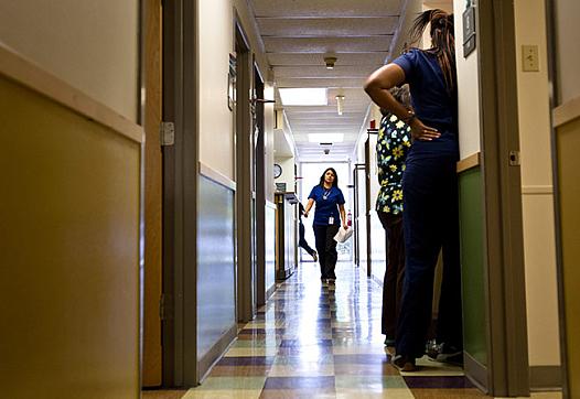 Medical staff check on patients at the People's Community Clinic in Austin, which provides state-subsidized women's health services to low-income women, on July 15, 2014. Photo by Callie Richmond.