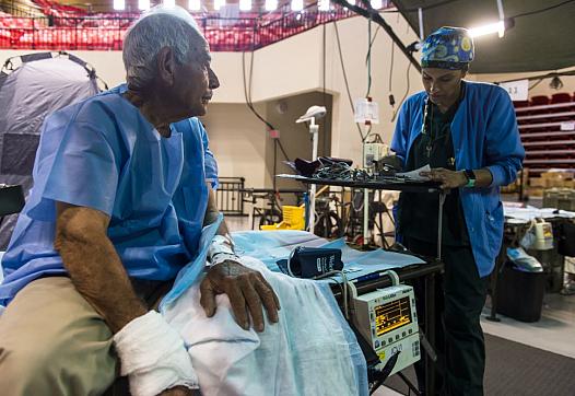 A local resident from Humacao, Puerto Rico, is prepared for hand surgery.