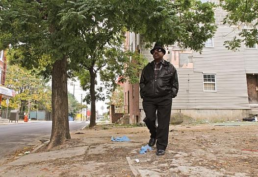 Andre Mears says he is aware of a bit of drug activity in the neighborhood but refuses to let himself be kept indoors. (Kimberly Paynter/for NewsWorks) 