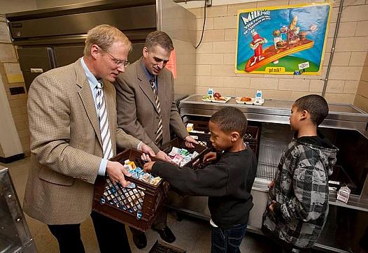Dr. Brian Wansink, left, visits elementary students in Ithaca, New York. Revelations about Wansink’s research methods led to his