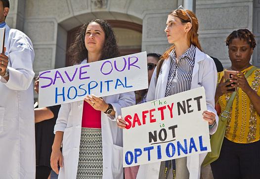 Employees, city officials, and unions rallied against the closing of Hahnemann hospital in Philadelphia in 2019. 