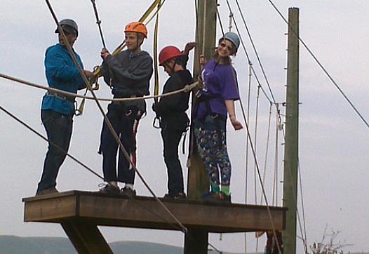 Taylor Gaydon (R), 15, ziplines with friends at the Diabetic Youth Foundation's diabetes camp in Livermore, a place where kids can have fun while learning to manage their disease.