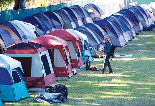  THE CITY AND COUNTY OF SANTA CRUZ HAVE PARTNERED IN A NEW MANAGED ENCAMPMENT IN SAN LORENZO PARK.