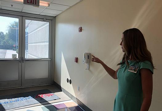 Michelle Oxford, CEO at Bakersfield Heart Hospital, shows where a gunman shot into the facility back in December of last year.