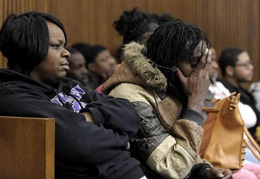 Lyvonne Cargill, left, listens with family members and friends on Thursday at the trial of Chauncey Owens and Charles Jones, who are accused of killing 17-year-old Je'Rean Blake Nobles. (Todd McInturf / The Detroit News)