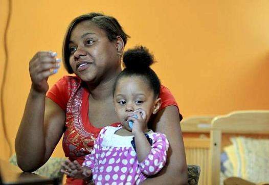 "It made me sad,' said Penelope Allen, now 21, of an abortion she underwent at age 15. 'I was still in school and I had to do what I had to do. I was a kid. People make mistakes.' She now has a daughter, Patience, who's almost 2. (Max Ortiz / The Detroit News)  