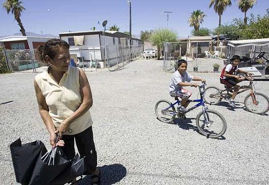 Ana Sanchez, a resident at St. Anthony's Mobilehome Park near Mecca, doesn't have a car to make the 20 minute drive to Coachella
