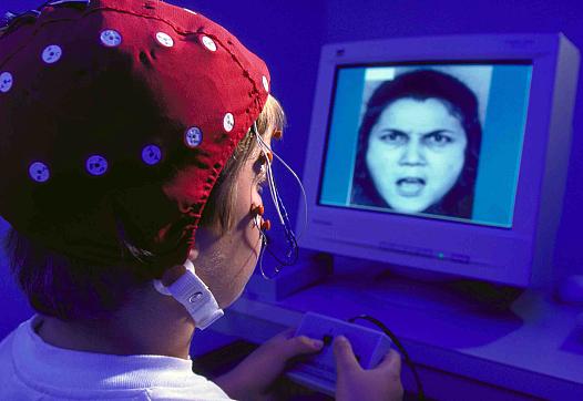 Researchers measured children’s brain activity while viewing facial expressions. Children who were abused were more likely to view ambiguous faces as angry. (Courtesy of the Child Emotion Lab at the University of Wisconsin - Madison)