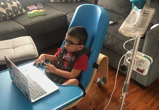Gavin Alcala, 3, of Los Angeles participates in an online class through his day care, Centro de Niños