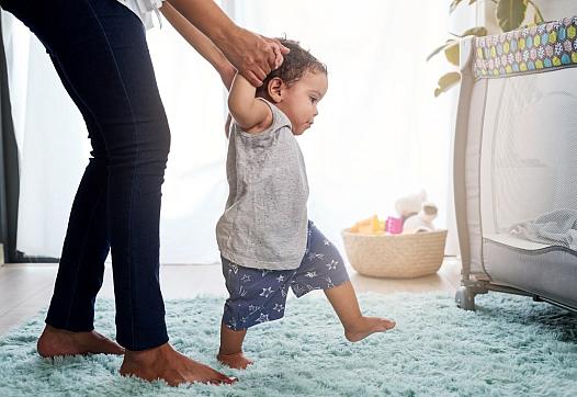 Baby learns to stand