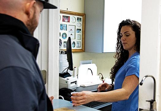 A client receives his dose of methadone from a dispensing nurse at C.O.R.E. Medical Clinic in Sacramento, California, on March.