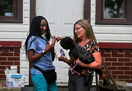 Laketa Watts, left, director of Essentially Empowered, a community organization, and Sherri Sherri Ohly, director of the Envisio