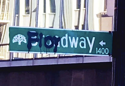 A street sign on Oakland, Calif. graffitied over to say "Floydway", seen during protests over the the death of George Floyd.