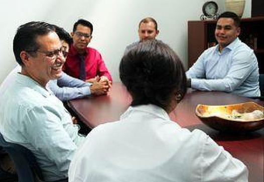 Dr. Michelle Bholat talks with students in the UCLA International Medical Graduate Program.