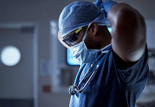 Medical Worker Wears a Mask for Protection