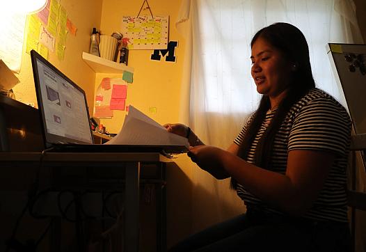 Luz Vazquez Hernandez talks about the papers she wrote for scholarships for college. Vazquez, 18, is the daughter of farmworkers