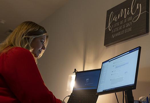 Paige Rosemond, Wake County Division of Child Welfare director, works from her home office in Wake Forest. 