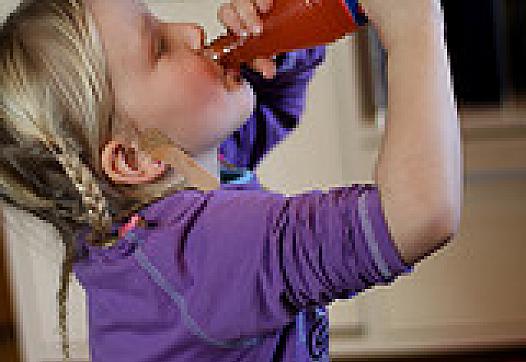 Kid drinking soda