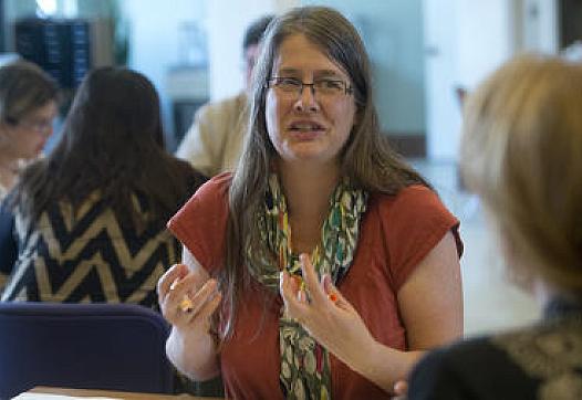 Dr. Abby Letcher, medical director of the Neighborhood Health Centers of the Lehigh Valley, participates in health and wellness discussion with team members and patients in the Lehigh Valley Super Utilizer Partnership.