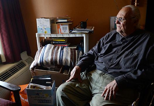Alvin Bolster who is a "super utilizer" of the healthcare system sits in his wheelchair inside his room at the Scottish Inn on Catasauqua Road in Hanover Township, Lehigh County. He has congestive heart failure and has been in and out of hospitals and hospice.