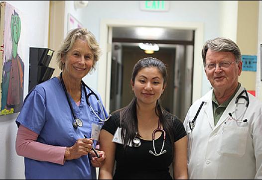 Kate Ratcliff and Amy Chao volunteer as nurses at RotaCare Richmond Free Medical Clinic at Brighter Beginnings. Dr. Pate Thomson, right, is the medical director in charge of adult care and a retired cardiologist. Photo by Momo Chang