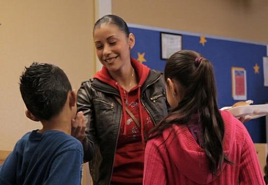 Federal health reform will leave out California's two million undocumented immigrants, a dilemma for multi-status families like Norma Navarro's. Her 7-year-old son Angel is a citizen, but her 10-year-old daughter Aneth is not, meaning they'll have significantly different health care experiences. Photo by Brian Myers, Media Arts Center San Diego